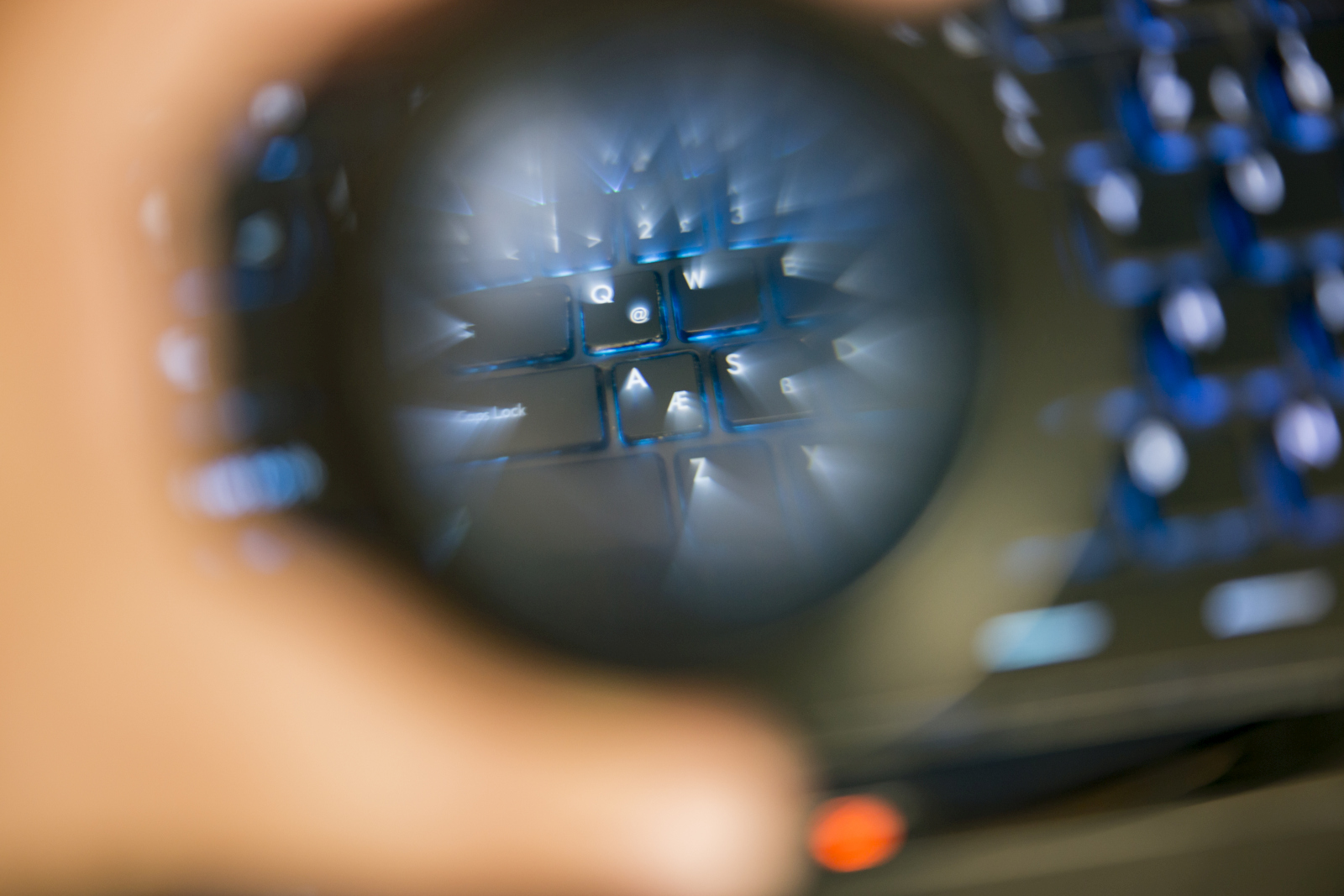 Close up keyboard view through to distracted lens